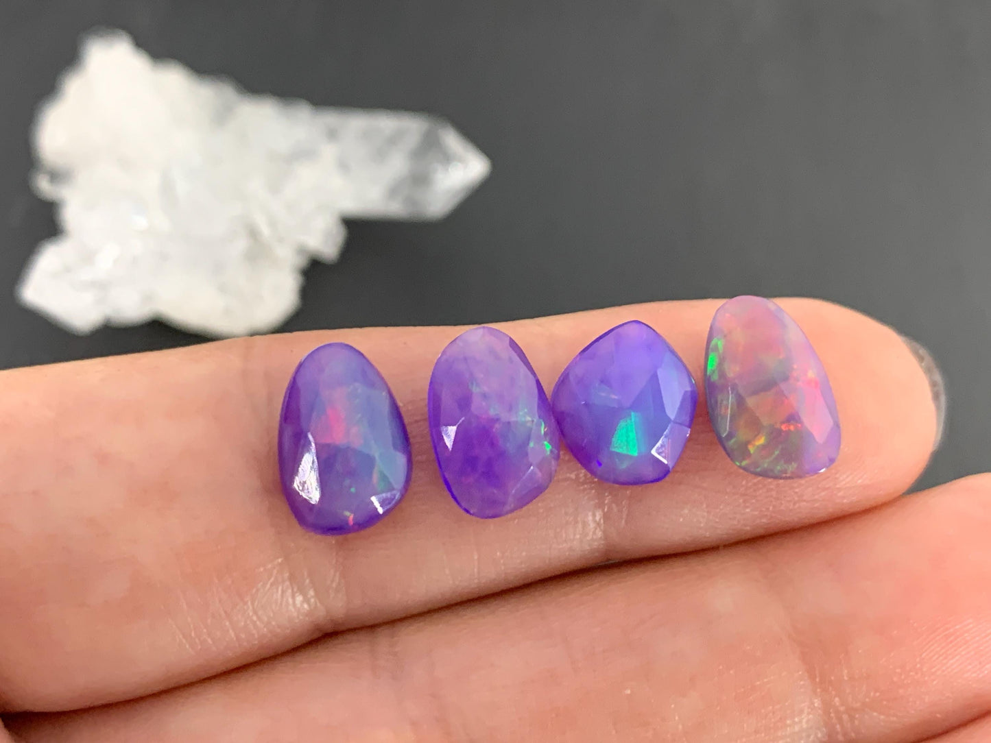 Faceted Ethiopian Purple Opal 9-11mm cabochon