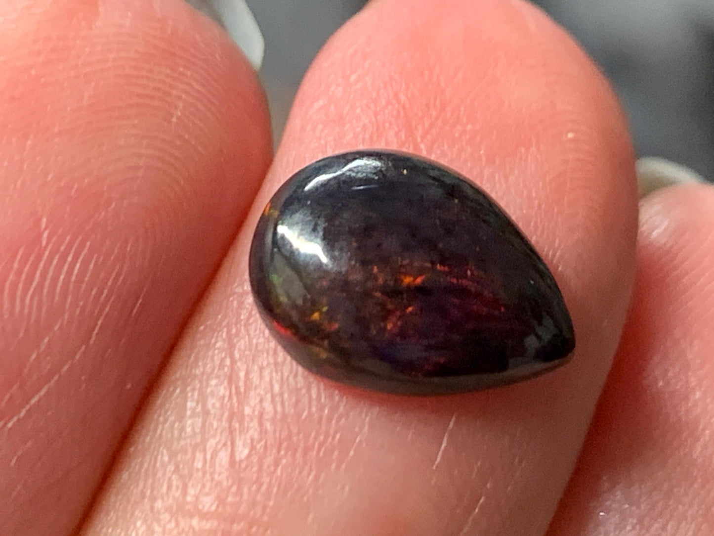 Natural Ethiopian Black Opal 8x11x4mm cabochon