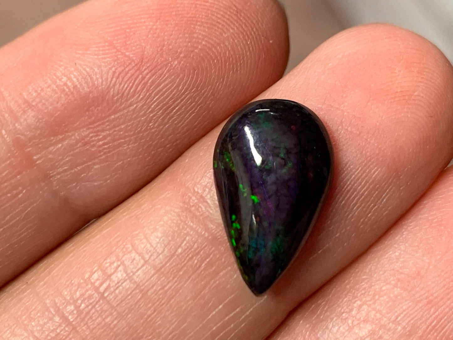 Black Ethiopian Opal pear 9x14x3mm cabochon
