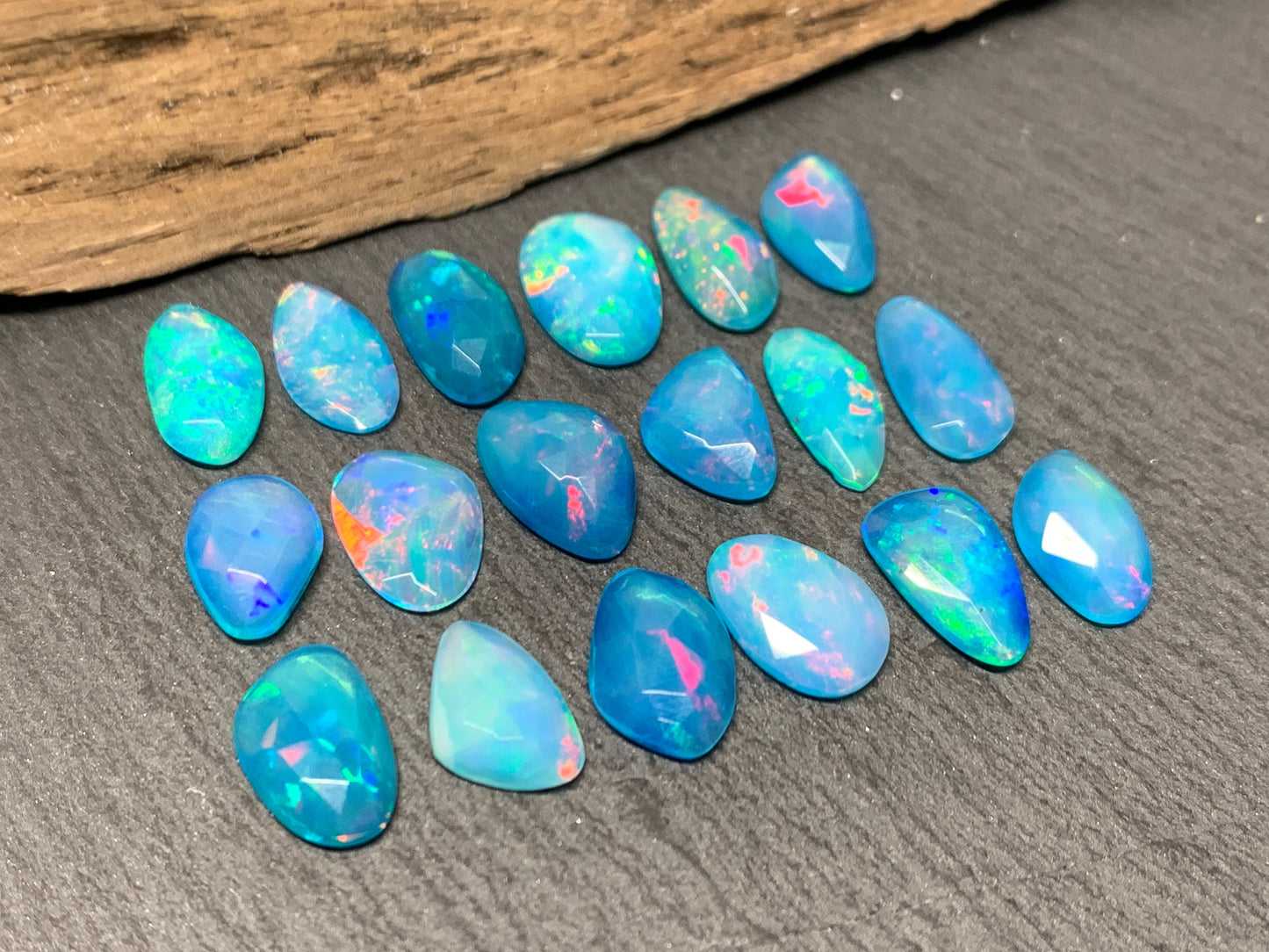 Faceted Blue Ethiopian Opal 11-12mm long cabochon