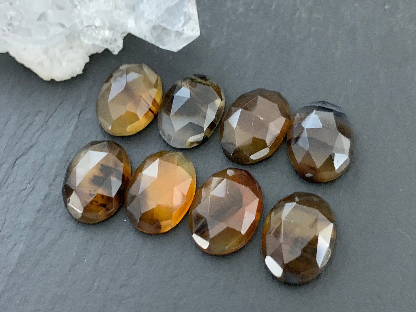 Faceted Montana Agate oval 10x14mm cabochon
