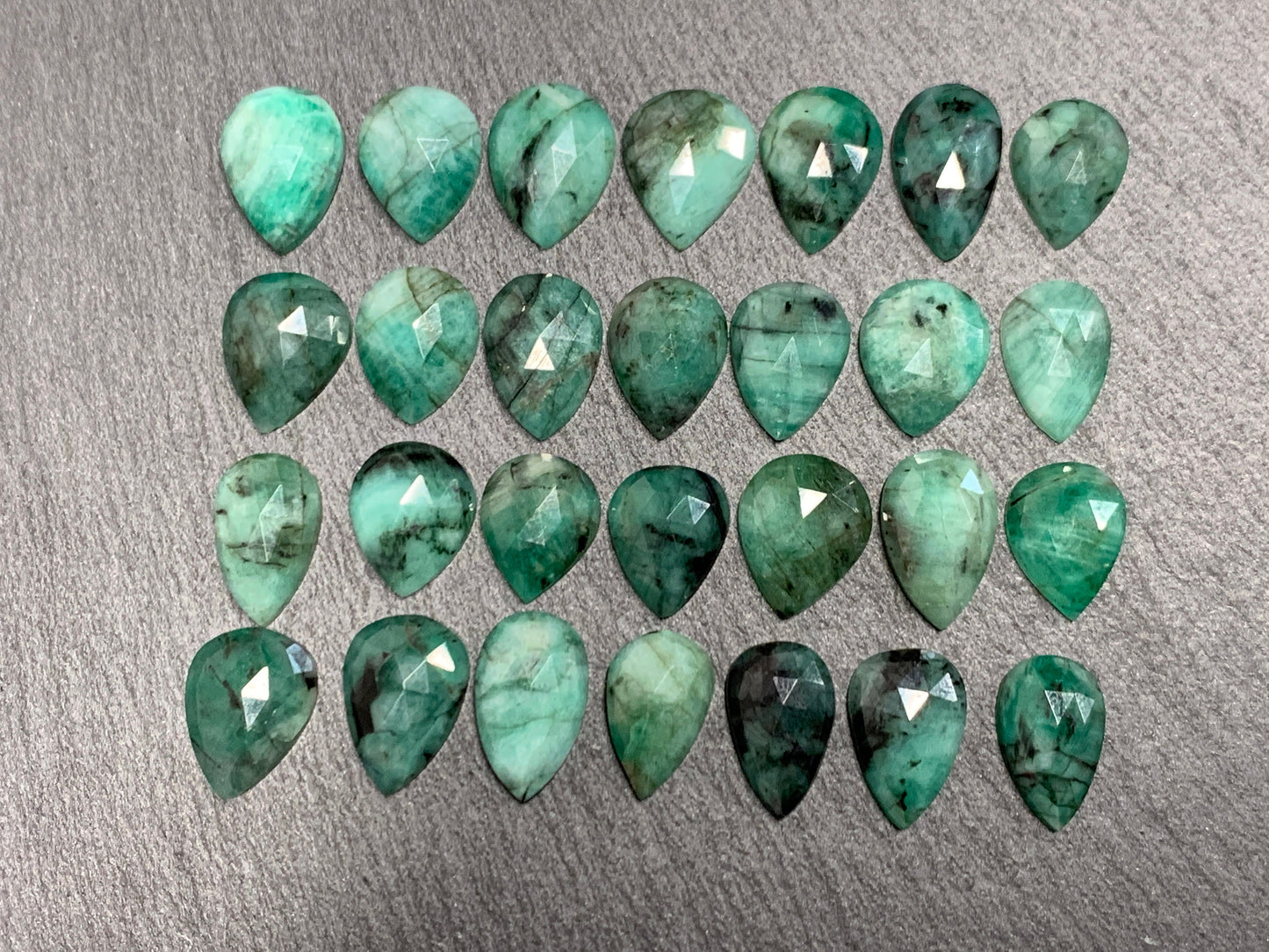 Emerald Faceted pear 12-14mm cabochon