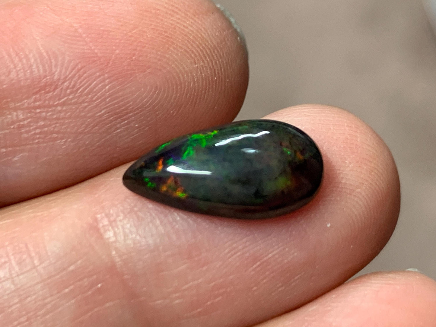 Black Ethiopian Opal pear 7x14x4mm cabochon