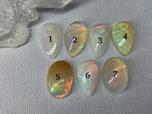 Ethiopian Opal pear 13mm long cabochon