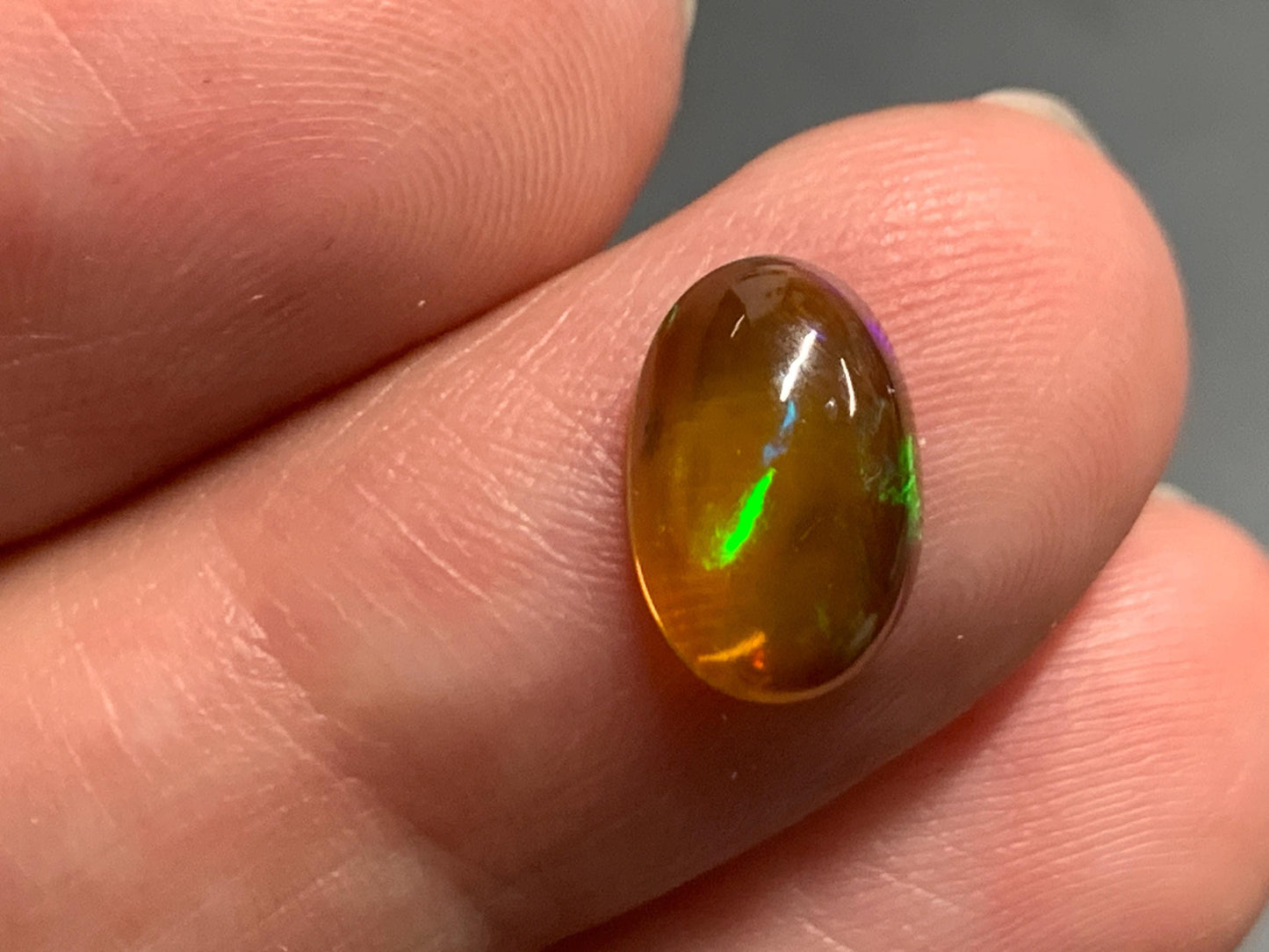 Natural Black Ethiopian Opal oval 6x10x4mm cabochon