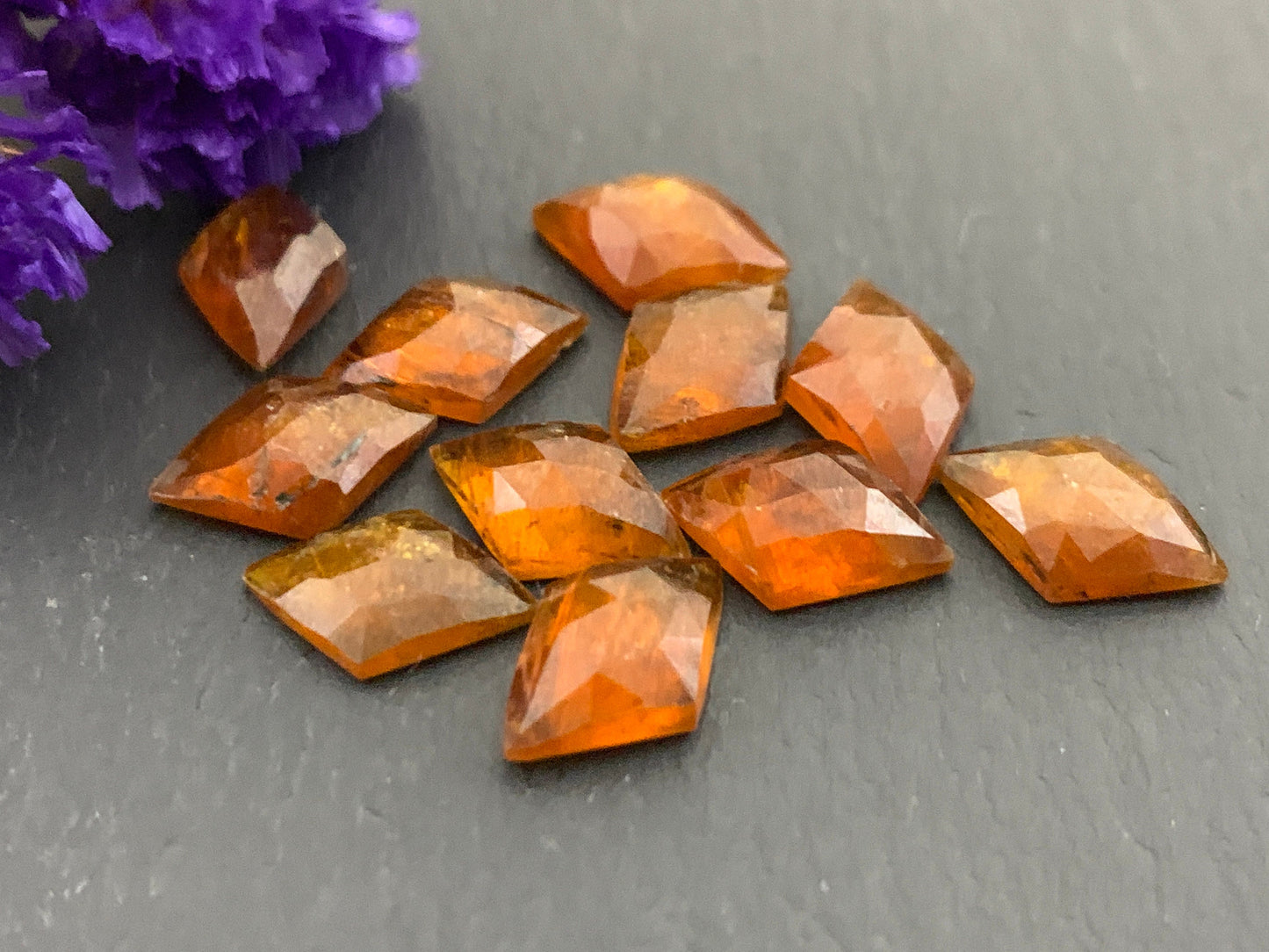 Faceted Orange Kyanite rhombus 8x12mm cabochon