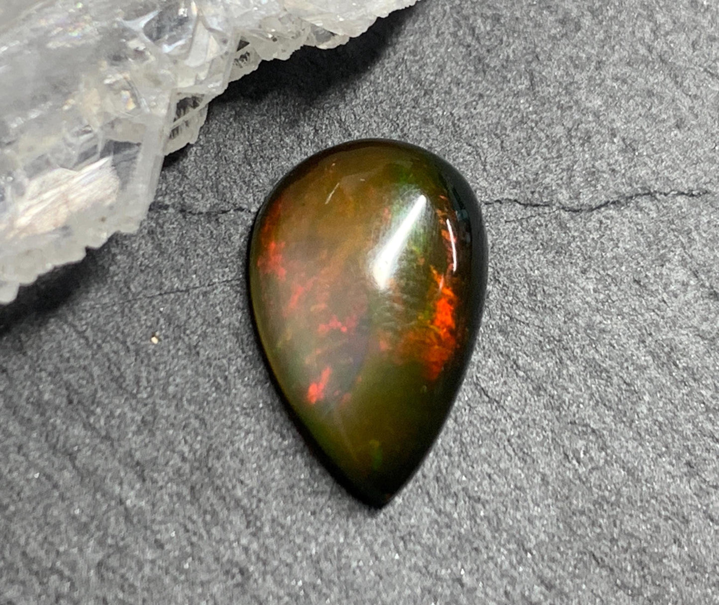 Natural Black Ethiopian Opal pear 8x13x4mm cabochon