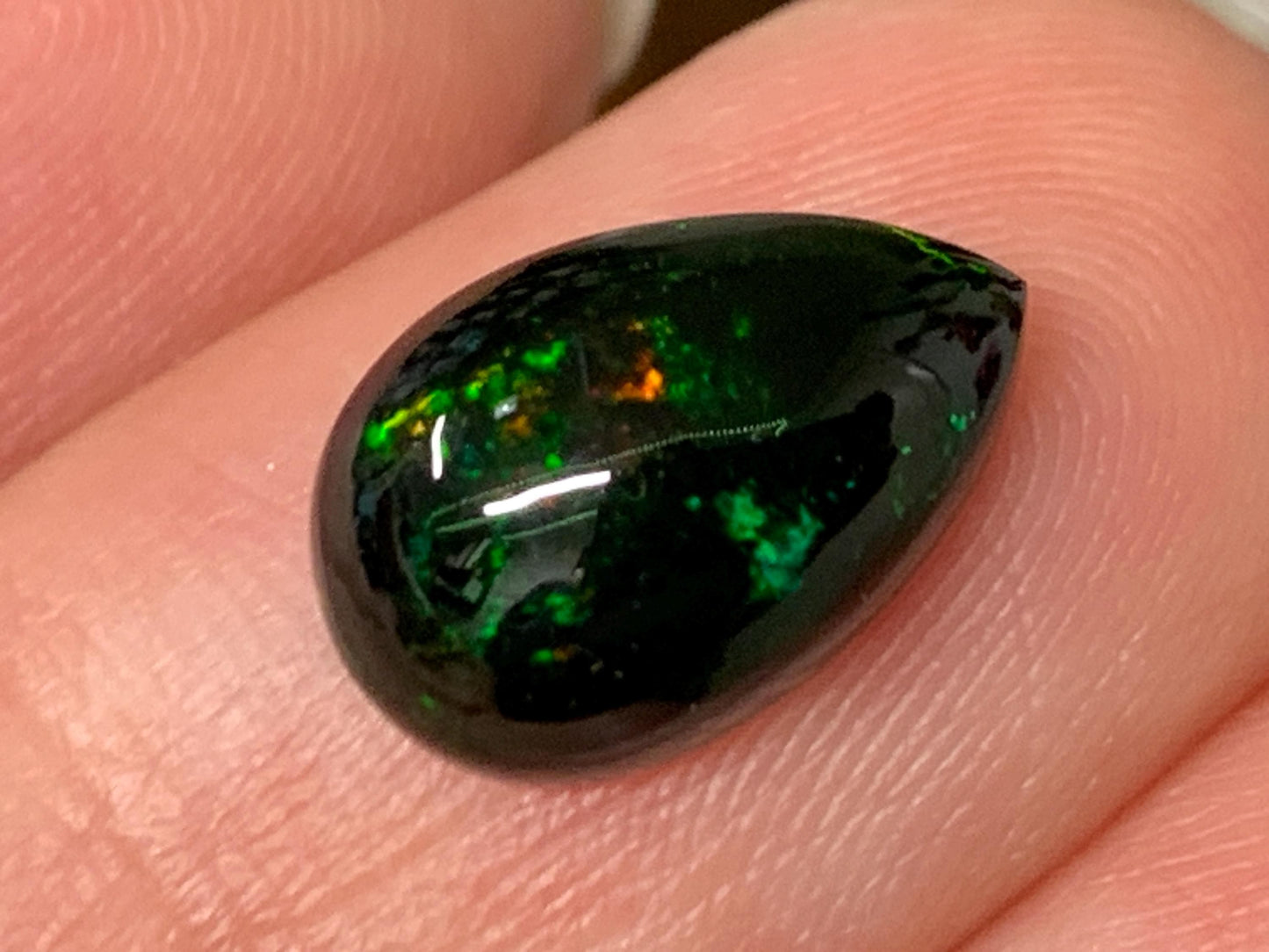 Natural Ethiopian Black Opal 8x12x4mm cabochon