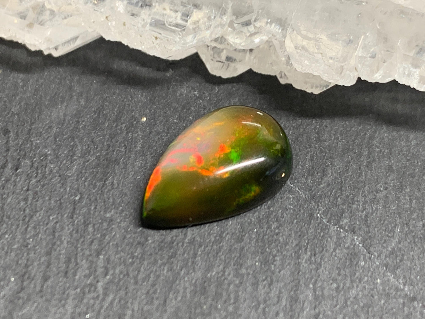 Natural Black Ethiopian Opal pear 8x13x4mm cabochon