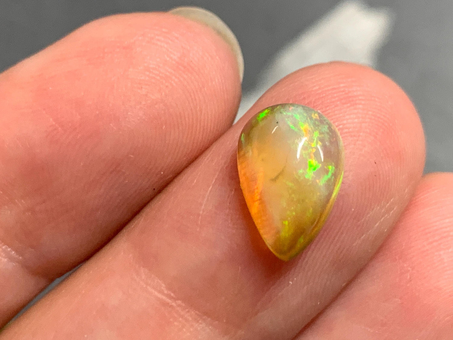 Natural Black Ethiopian Opal pear 8x11x5mm cabochon