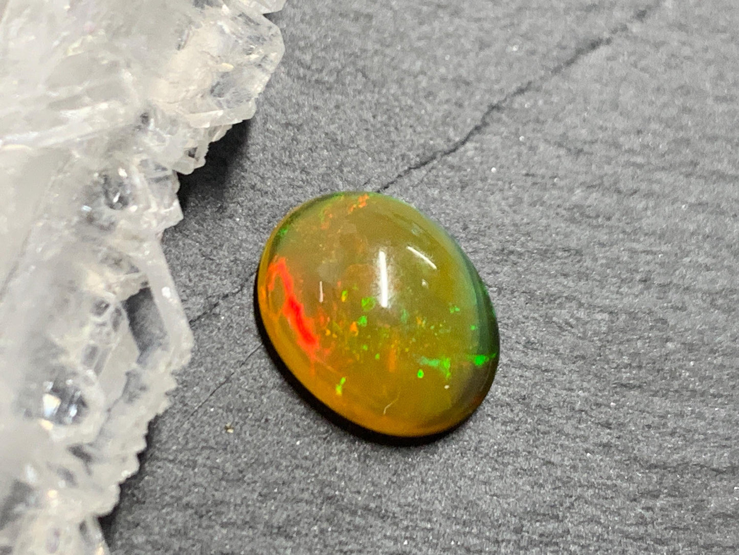 Natural Black Ethiopian Opal oval 9x11x4mm cabochon