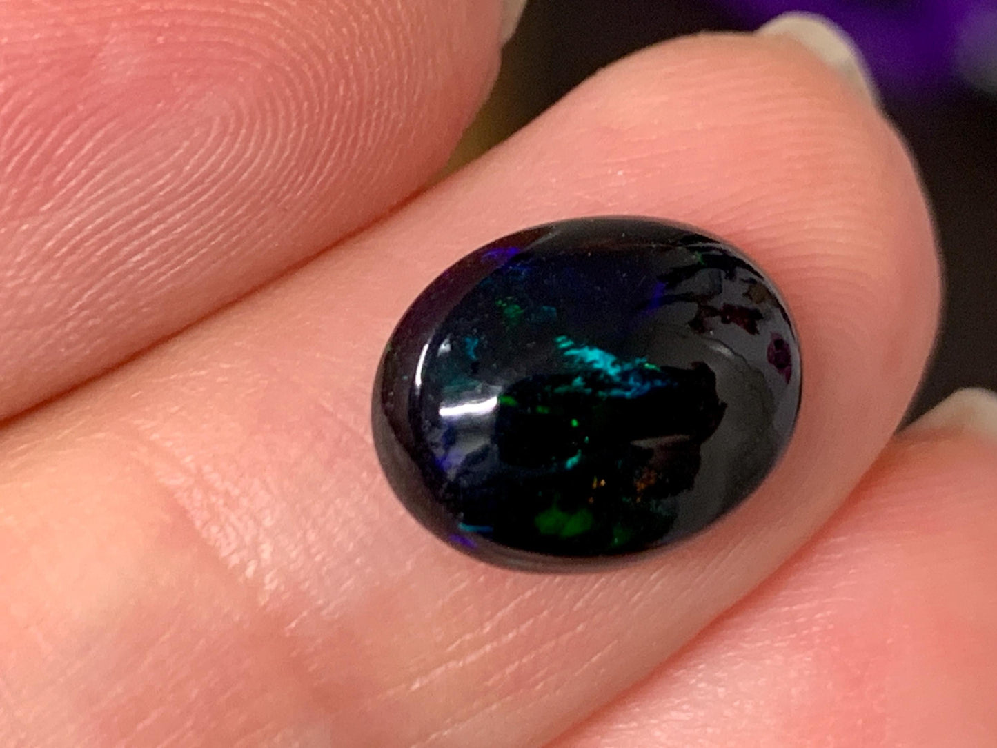 Natural Ethiopian Black Opal 9x11x4mm cabochon