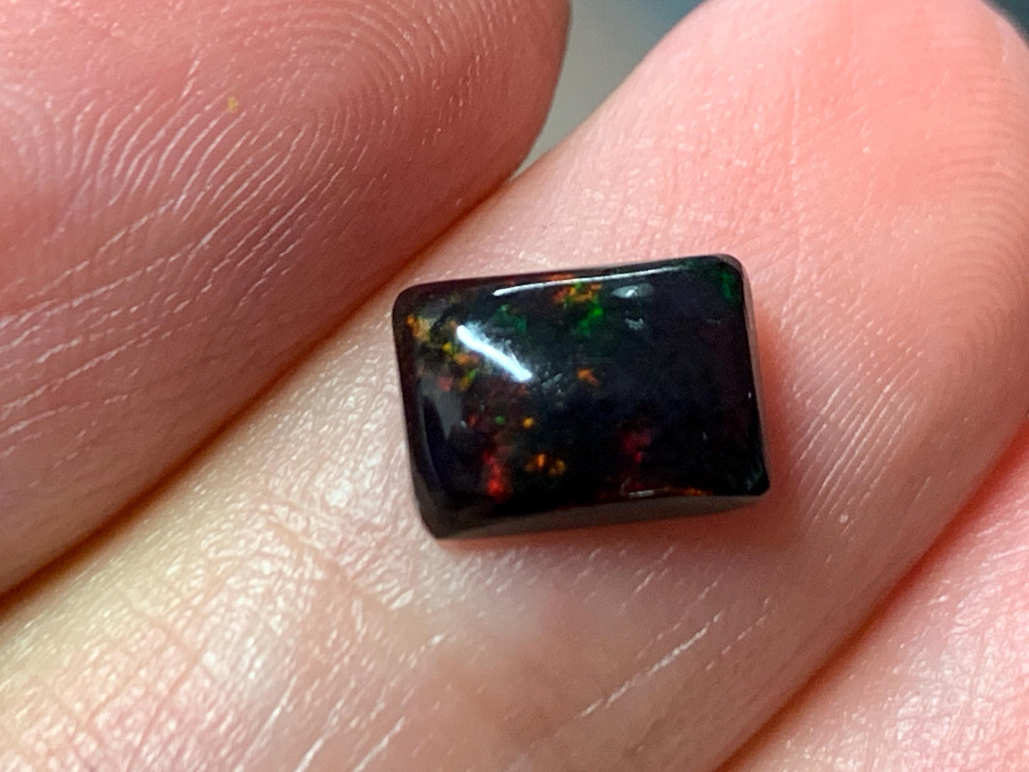 Natural Ethiopian Black Opal 6x8x3mm cabochon