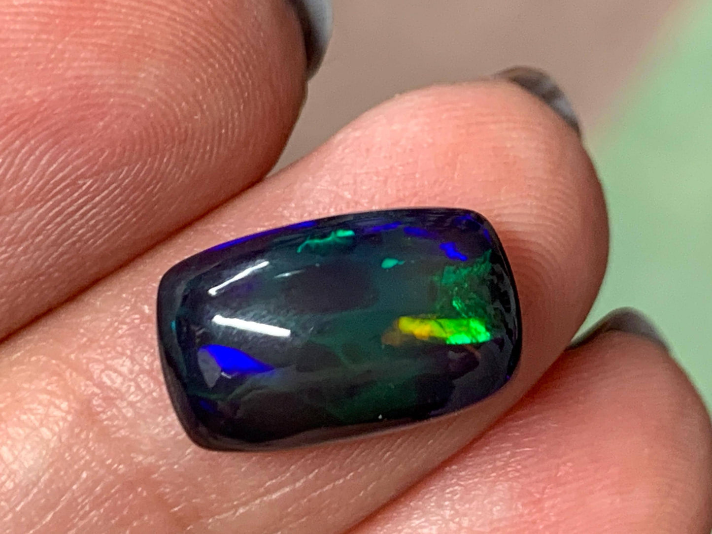 Natural Ethiopian Black Opal 9x14x5mm cabochon