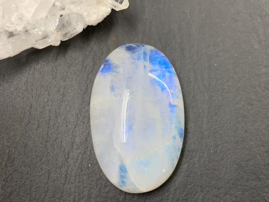 Rainbow Moonstone oval 33x21x9mm cabochon