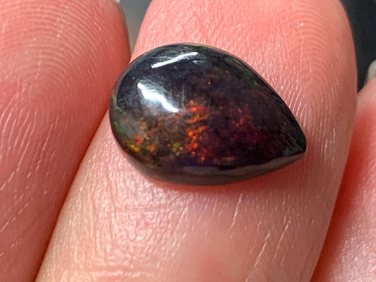 Natural Ethiopian Black Opal 8x11x4mm cabochon