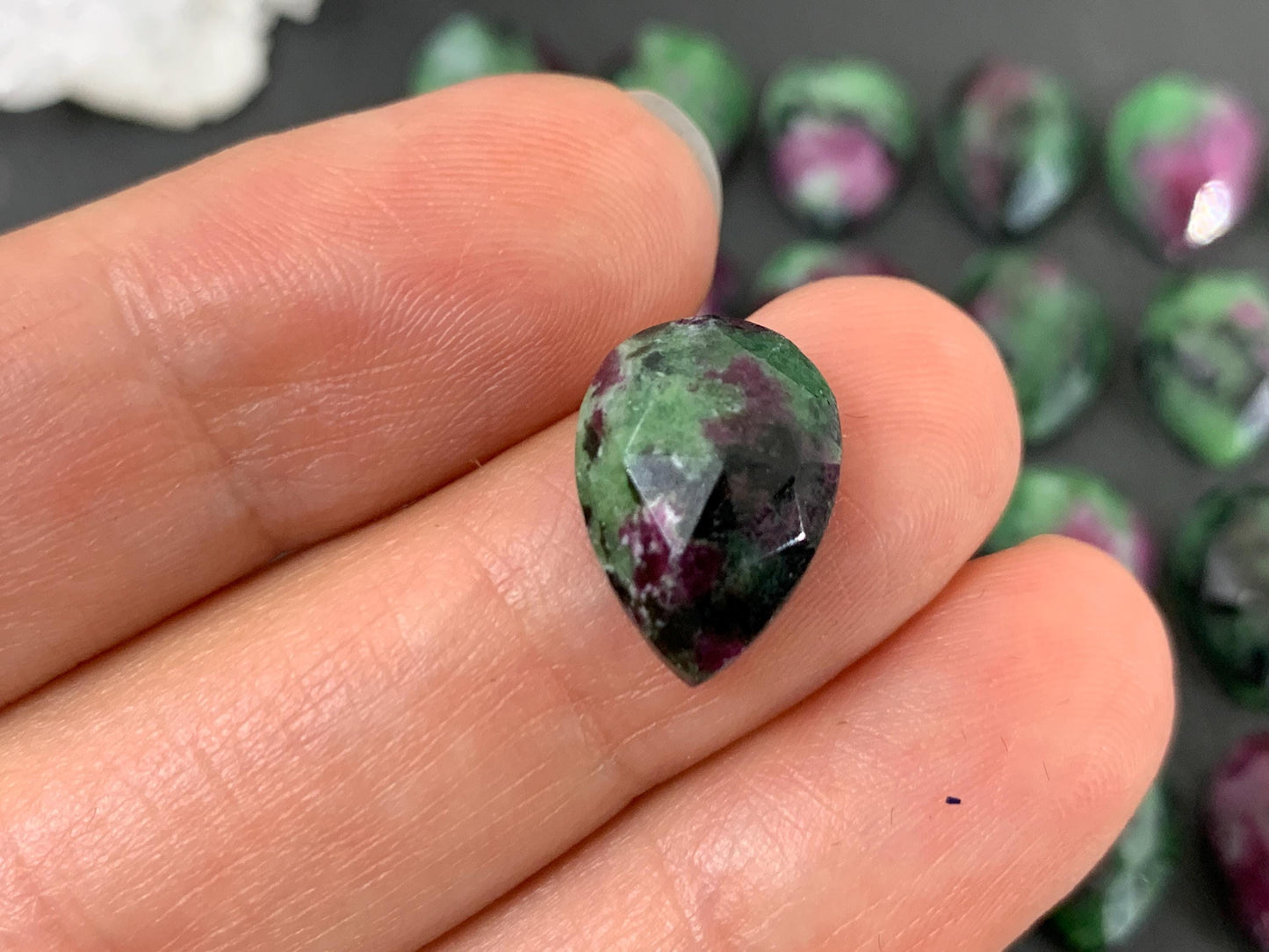 Faceted Ruby Zoisite pear 10x14mm cabochon