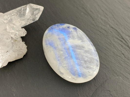 Rainbow Moonstone oval 35x24x9mm cabochon