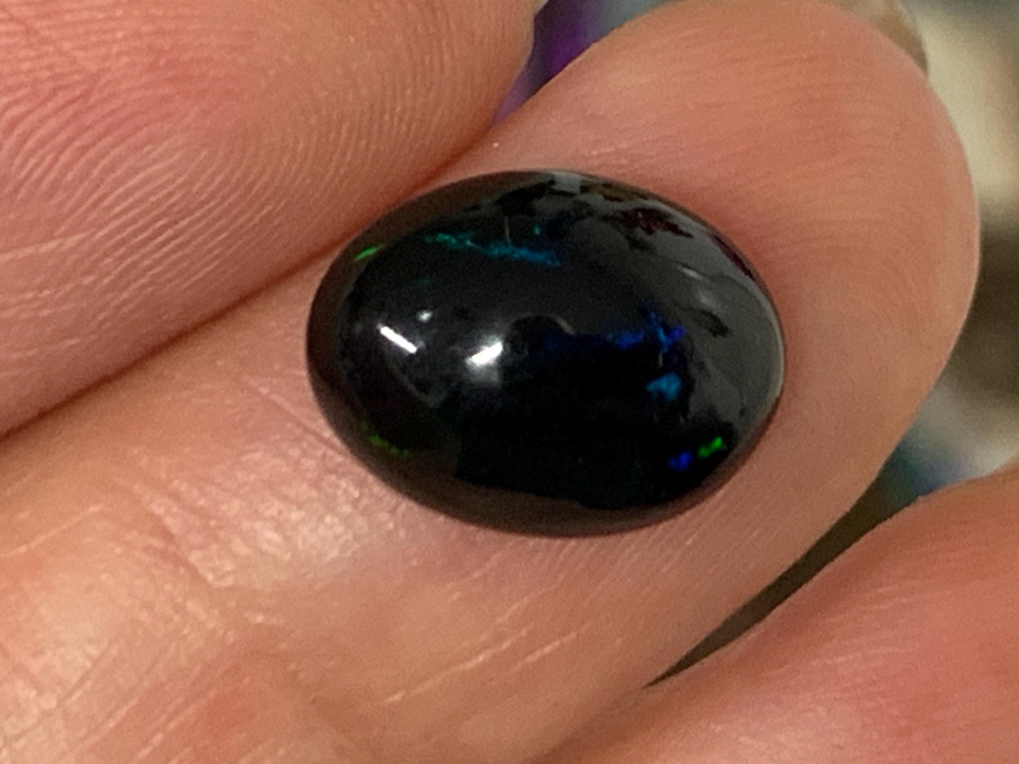 Natural Ethiopian Black Opal 9x12x5mm cabochon
