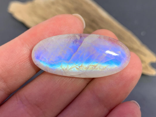 Rainbow Moonstone oval 37x17x7mm cabochon