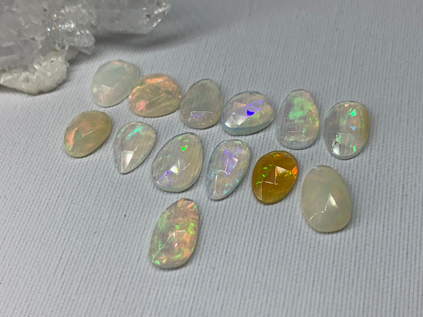 Faceted Ethiopian Opal 10-12mm long cabochon