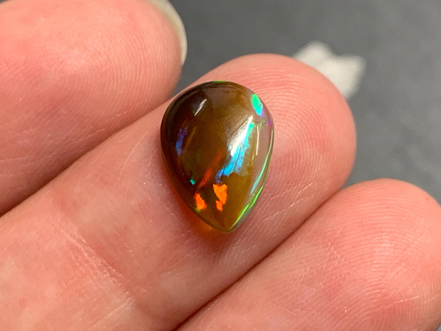 Natural Black Ethiopian Opal pear 9x12x3mm cabochon