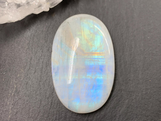 Rainbow Moonstone 35x22x7mm cabochon. Second quality cabochon