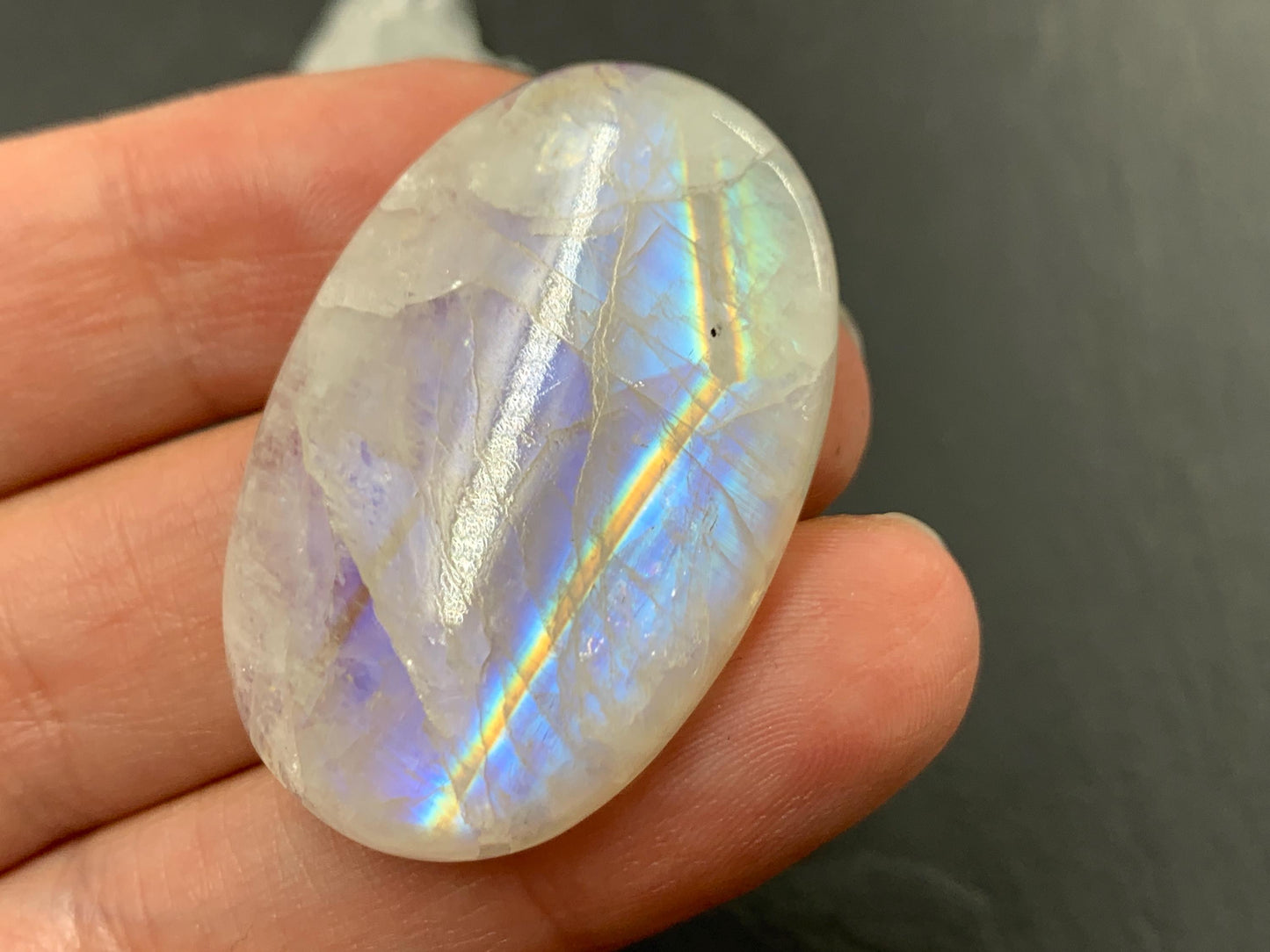 Rainbow Moonstone oval 38x25x7mm cabochon