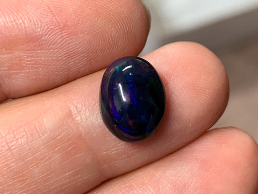 Black Ethiopian Opal oval 9x11x4mm cabochon