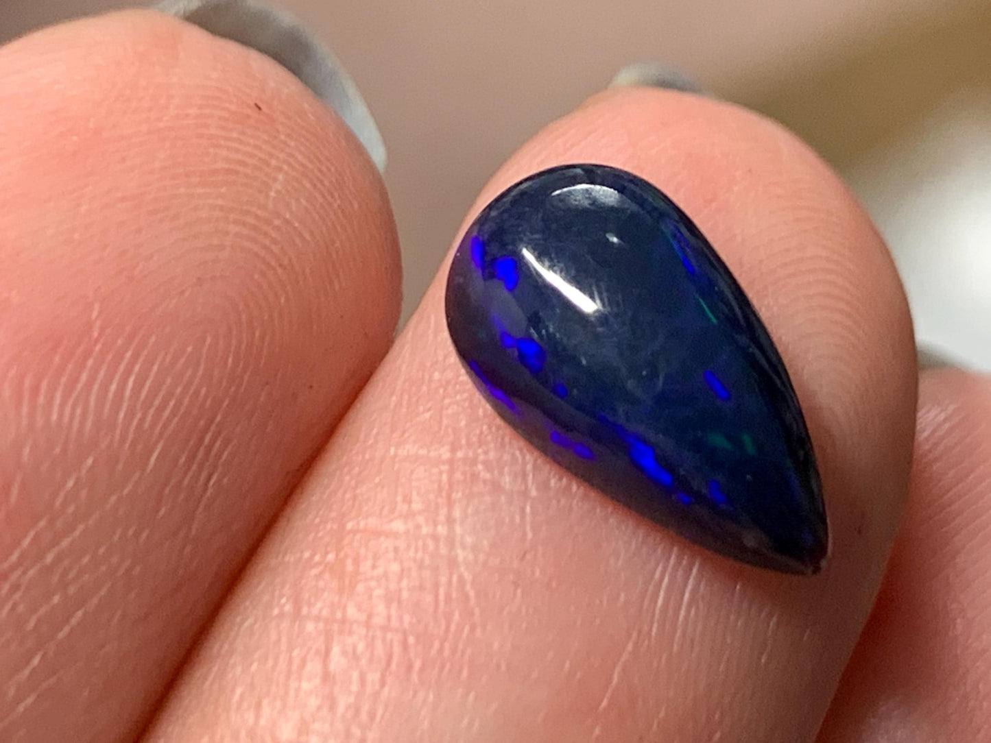 Natural Ethiopian Black Opal 7x12x4mm cabochon