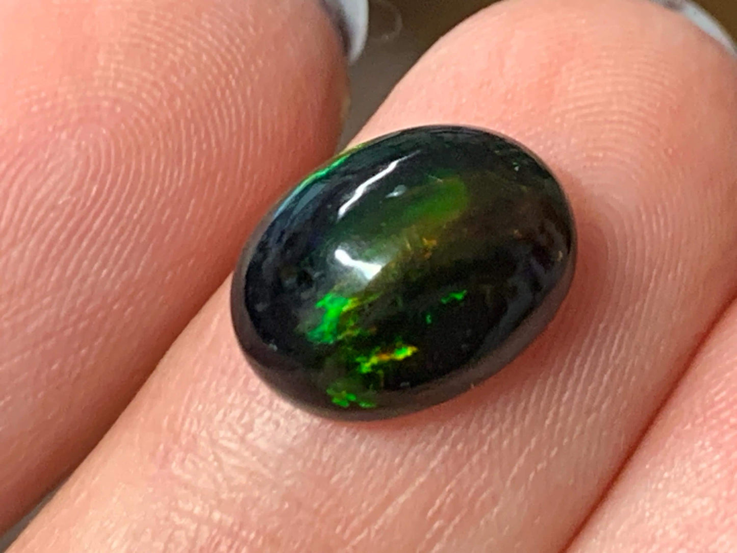 Natural Ethiopian Black Opal 9x12x5mm cabochon