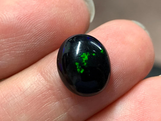 Natural Ethiopian Black Opal 10x12x5mm cabochon
