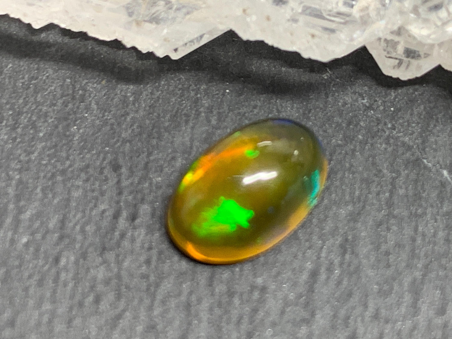 Natural Black Ethiopian Opal oval 6x10x4mm cabochon