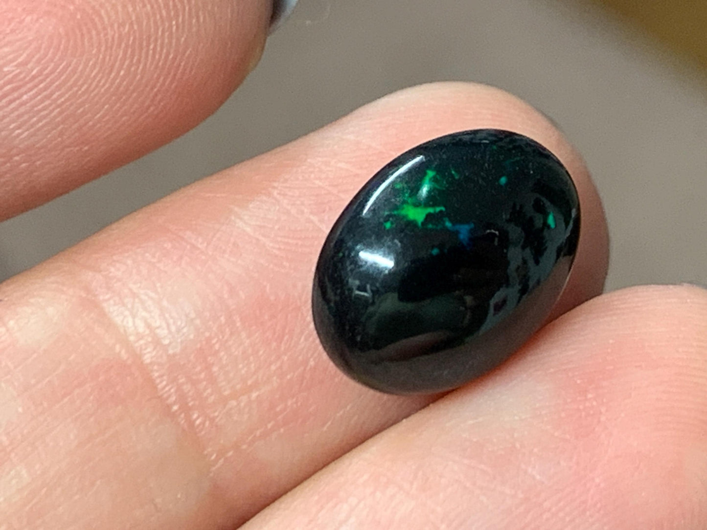 Natural Ethiopian Black Opal 10x12x5mm cabochon