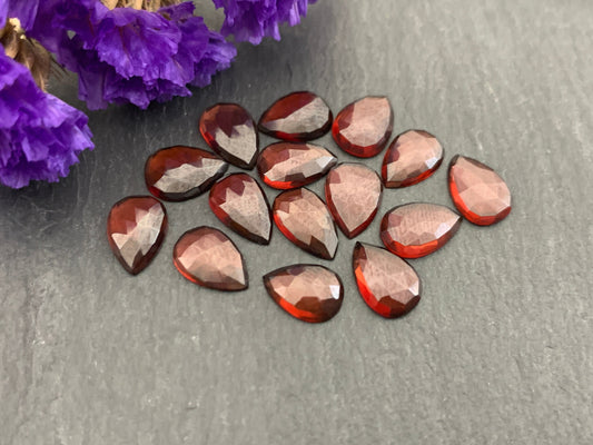 Faceted Hessonite Garnet pear 6x8mm cabochon