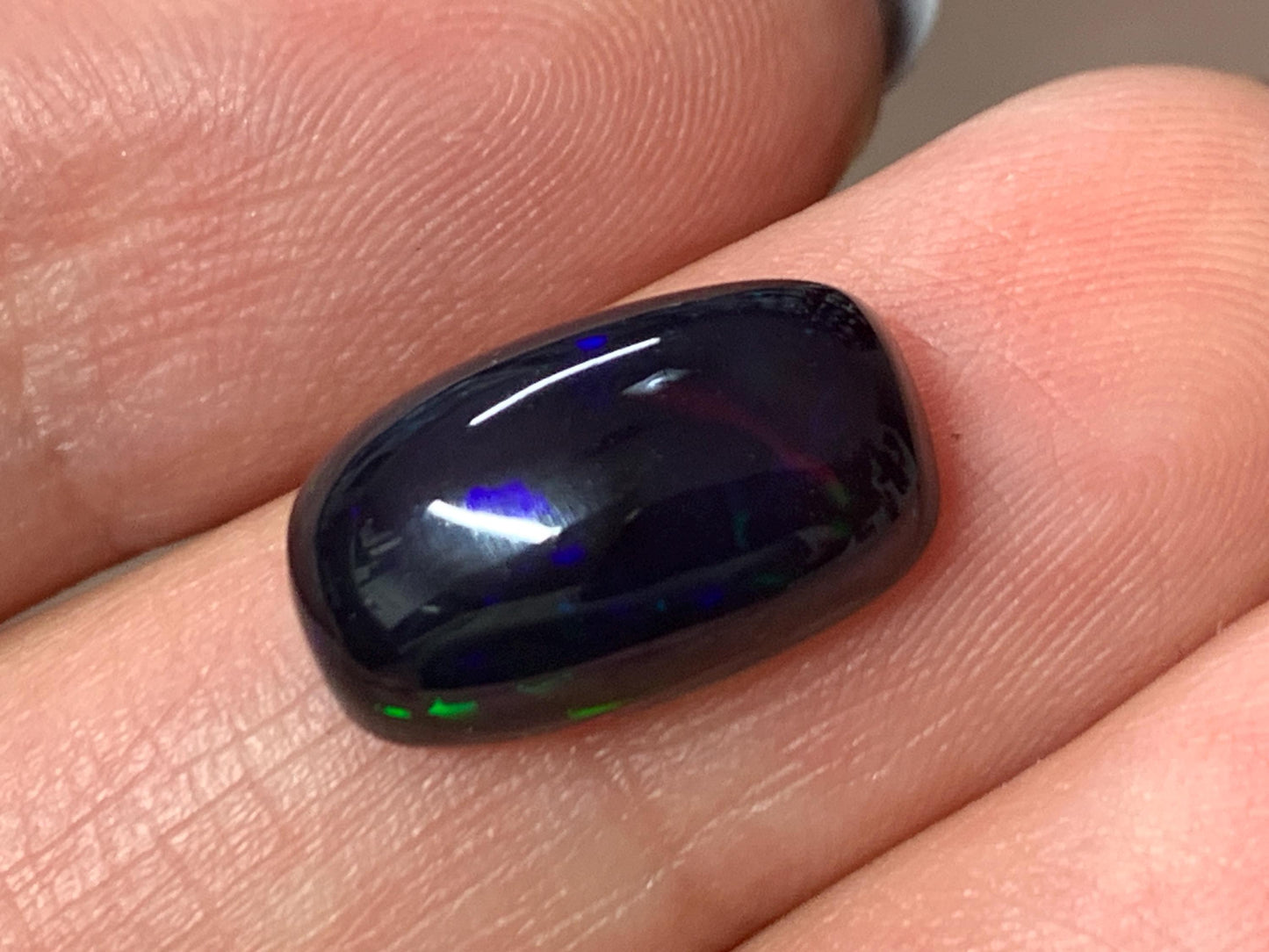 Natural Ethiopian Black Opal 8x14x5mm cabochon