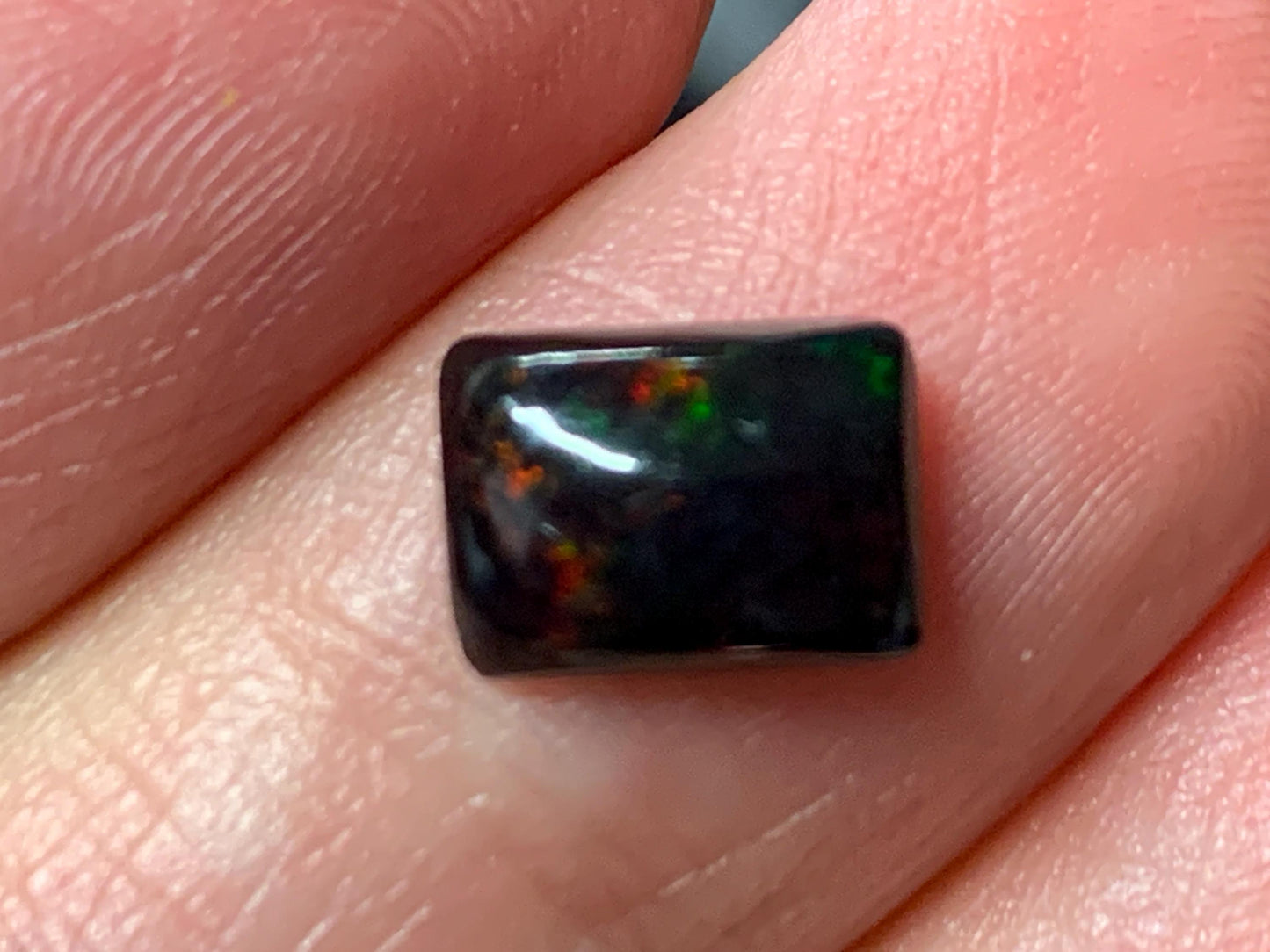 Natural Ethiopian Black Opal 6x8x3mm cabochon