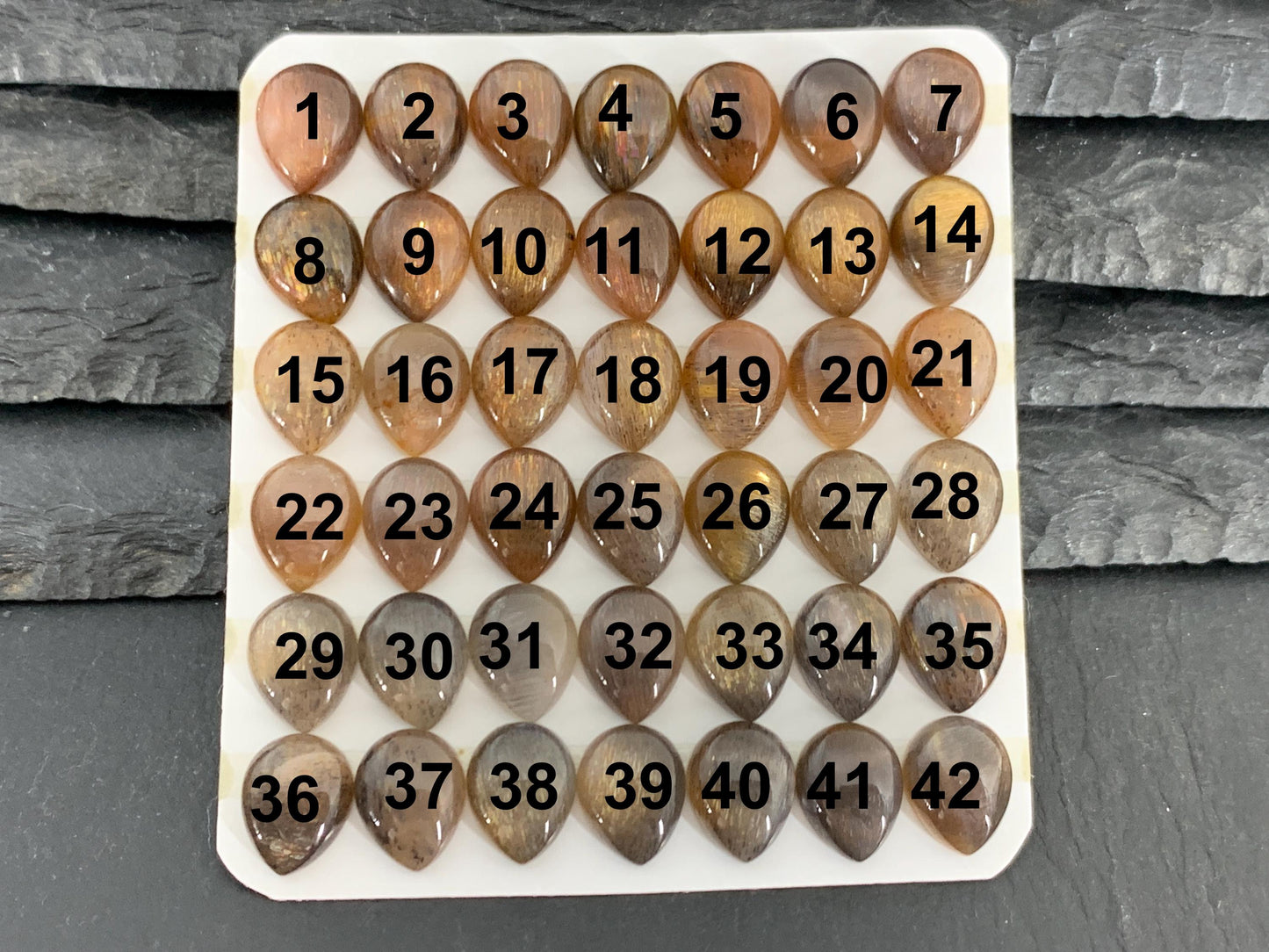 Gold Sunstone pear 8x10mm cabochon