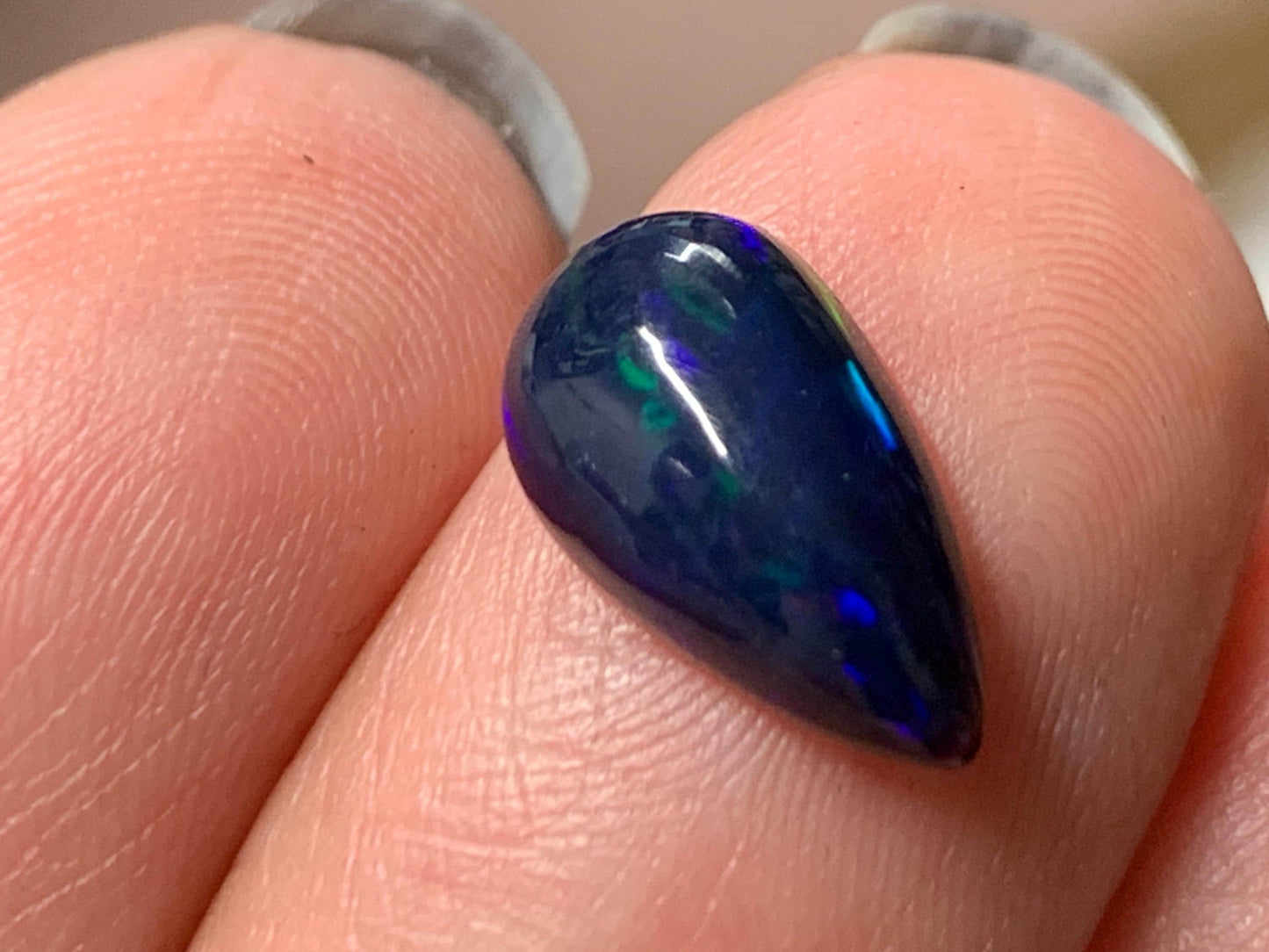 Natural Ethiopian Black Opal 7x12x4mm cabochon
