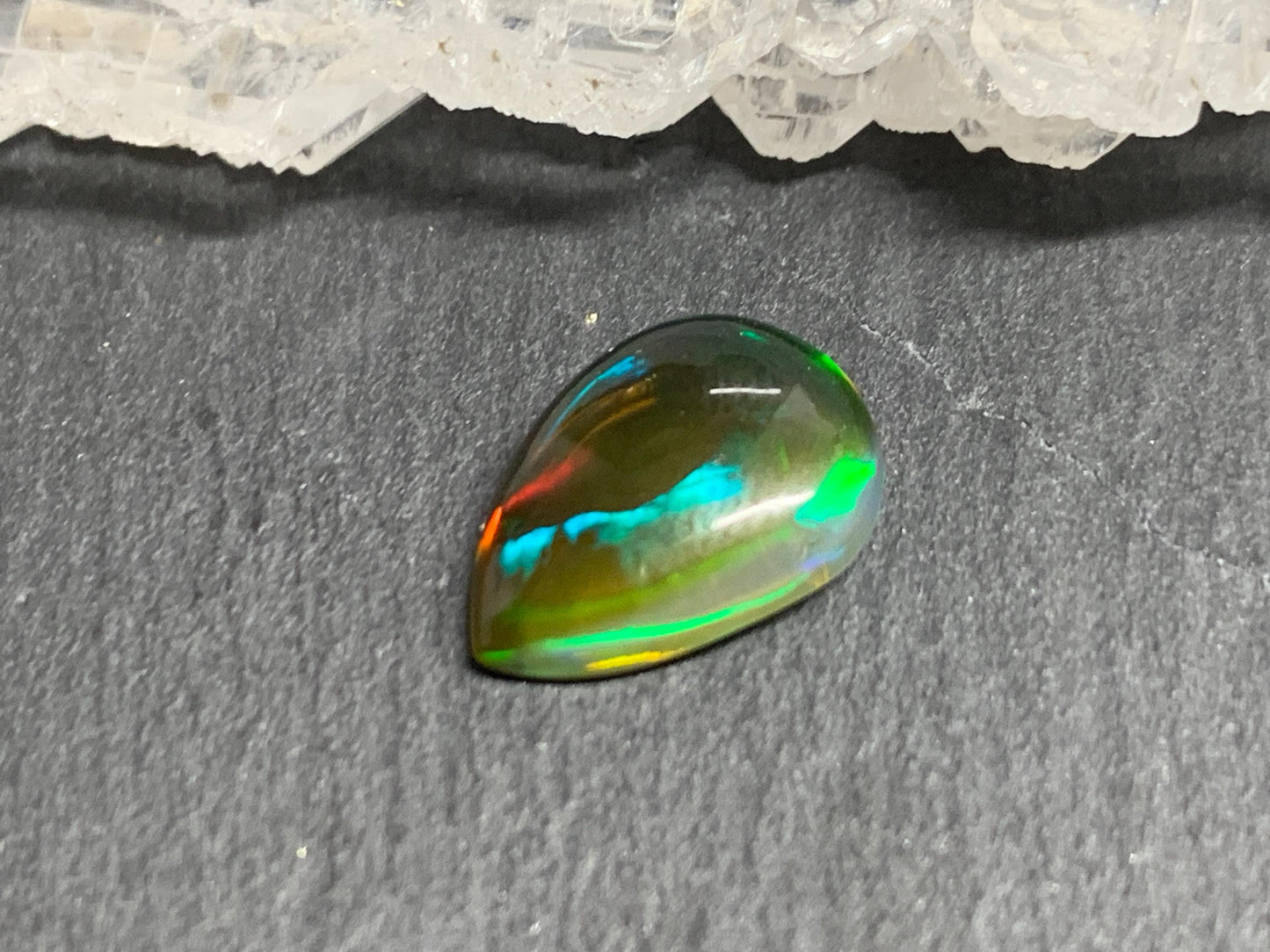 Natural Black Ethiopian Opal pear 9x12x3mm cabochon