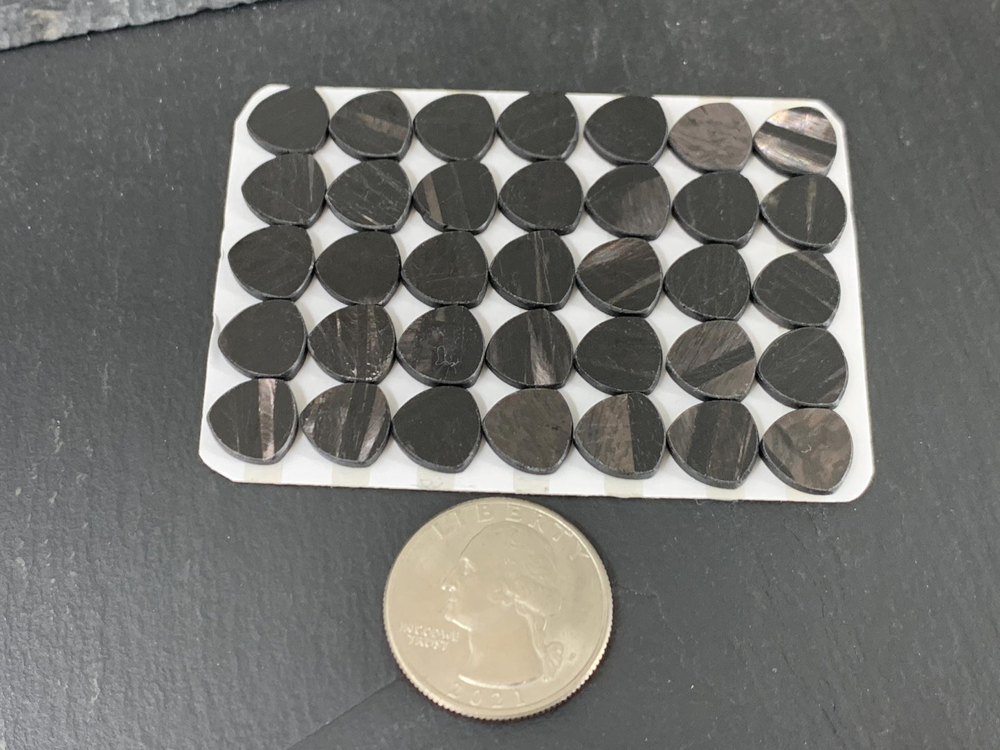Flat Hypersthene curved triangle 10mm cabochon - Calibrated cabochons