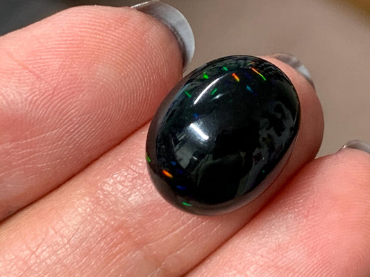 Natural Ethiopian Black Opal 13x16x5mm cabochon