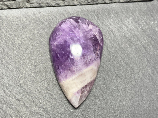 Amethyst pear 38x23x11mm cabochon - free form hand cut in Africa