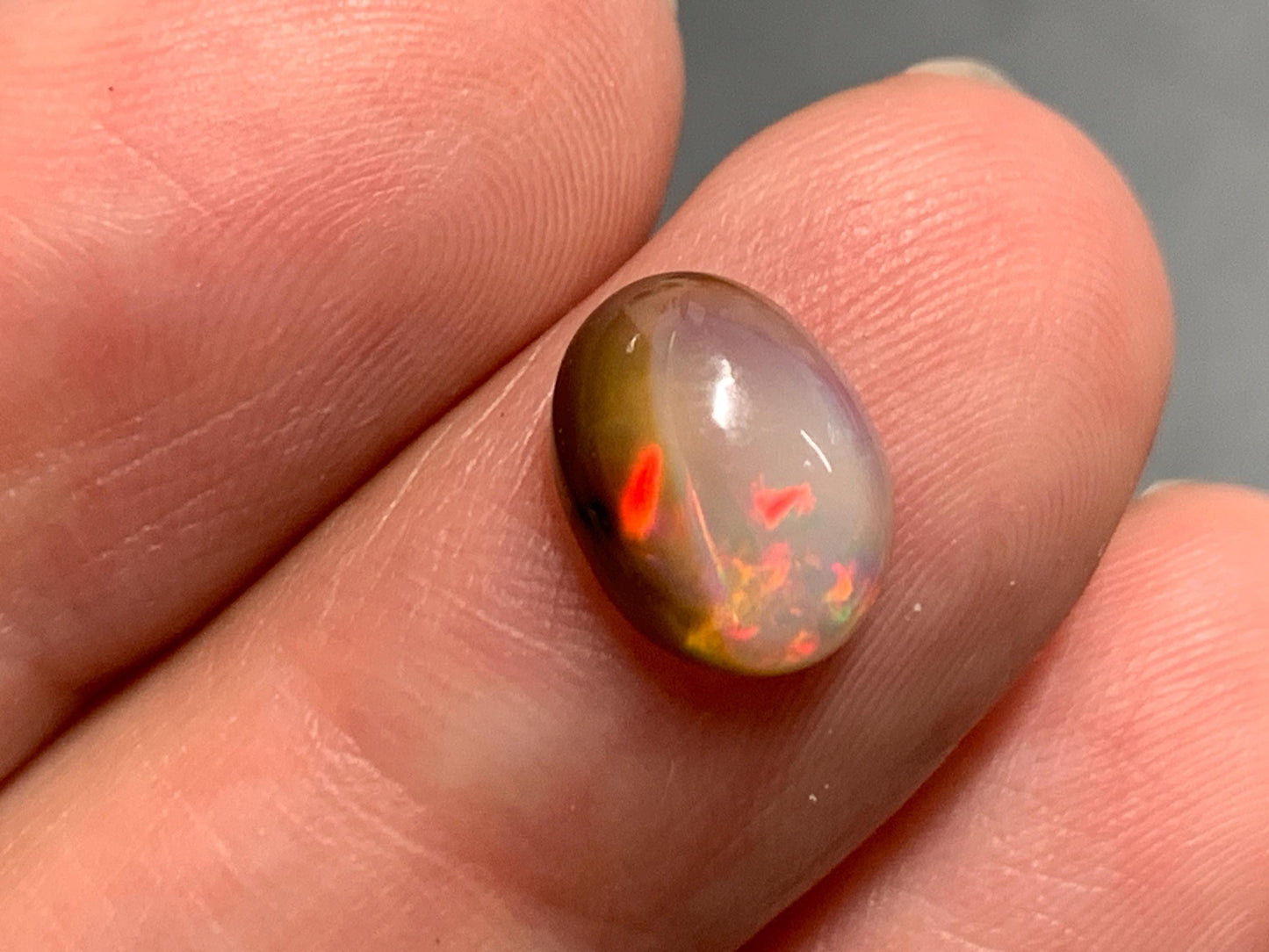 Natural Black Ethiopian Opal oval 7x10x4mm cabochon