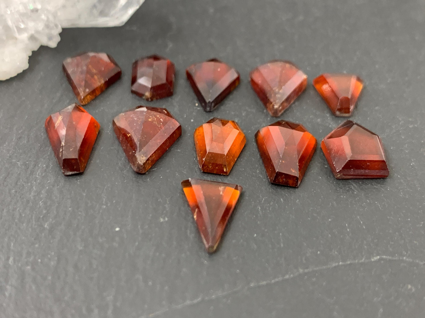 Faceted Hessonite Garnet 9-12mm long cabochon.