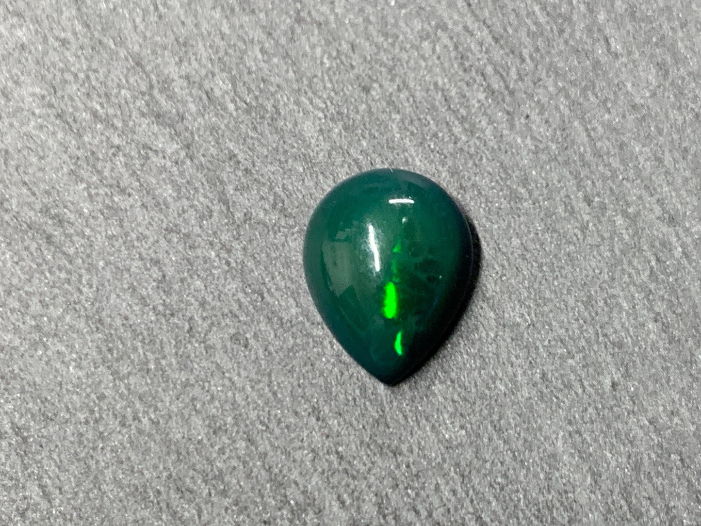 Black Ethiopian Opal pear 8x10x4mm cabochon