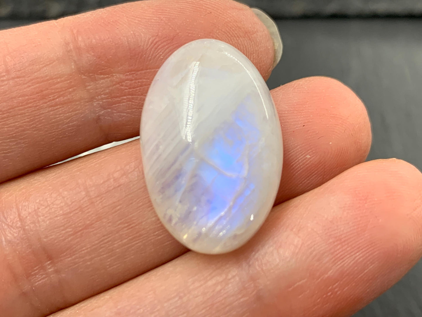 Rainbow Moonstone oval 24x16x9mm cabochon
