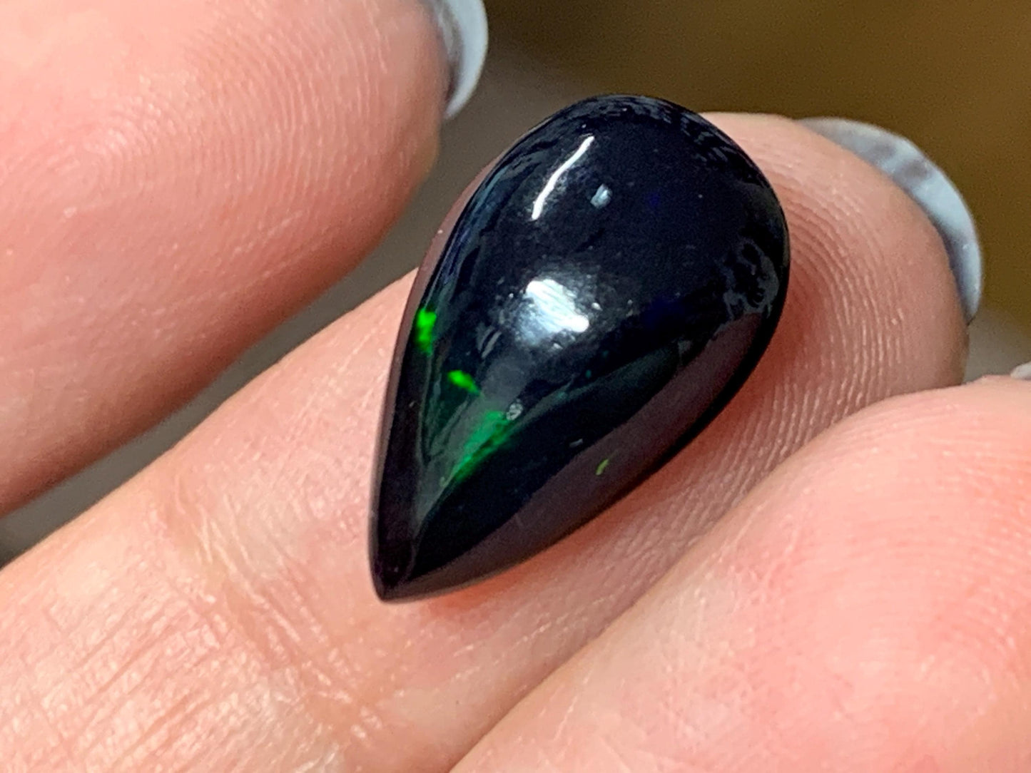 Natural Ethiopian Black Opal 10x16x5mm cabochon