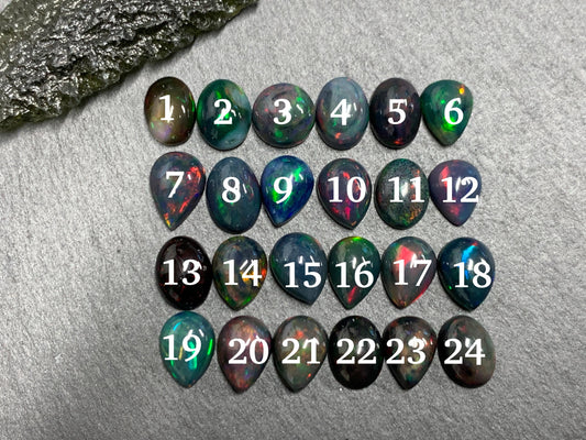 Black Ethiopian Opal 6x8mm cabochon