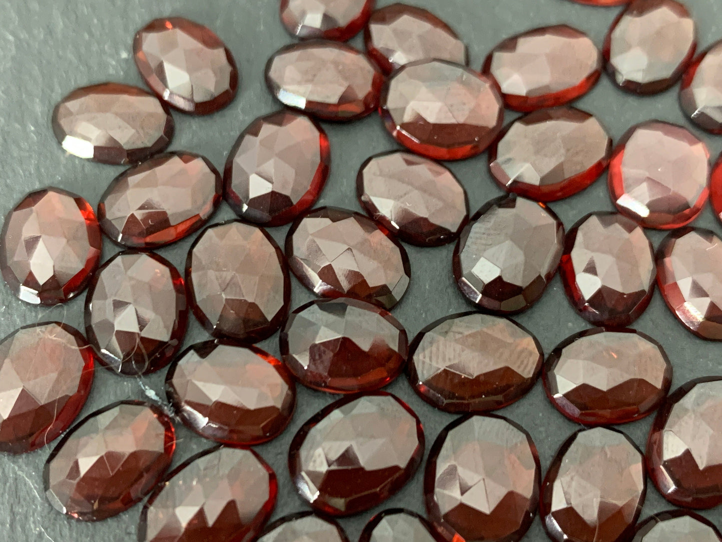 Faceted Mozambique Garnet 8-9.5mm long oval Cabochon